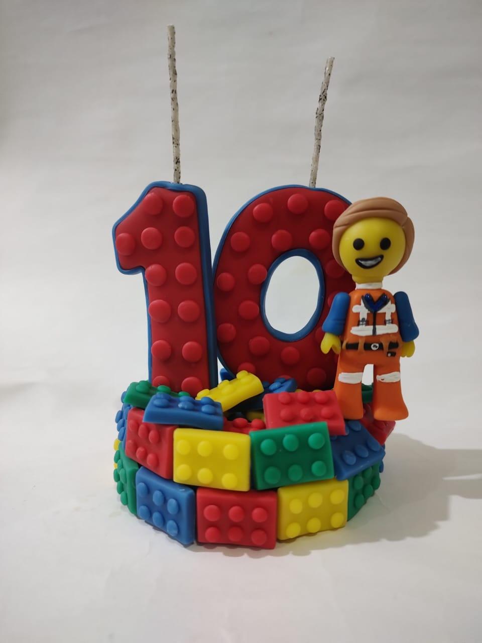 Vela em biscuit lego