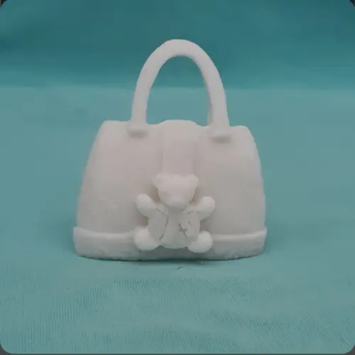 Bolsa de resina com urso